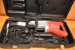 A boxed as new Milwaukee Kango breaker K950S (Requires a UK adaptor).