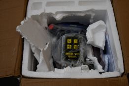 A boxed Airless Paint sprayer cosmetic damage to box and inside packaging.