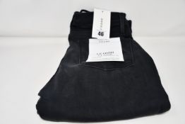 A pair of as new Frame Le High Flare jeans in condor (Size 27).