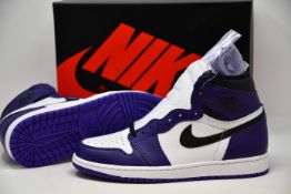 A pair of as new Nike Air Jordan 1 High OG (UK 7).
