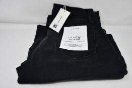 A pair of as new Frame Le High Flare jeans in condor (Size 30).