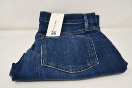 A pair of as new Frame Le Beau jeans in Burnside (Size 29).