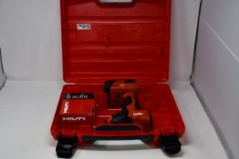 A boxed Hilti impact driver and battery (SID22-A).