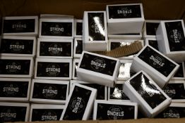 A box of Smart House Tools Strong Neodymium magnetic hooks (Approximately 32 items).