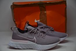 A pair of women's as new Nike React Infinity Run Flyknit trainers (UK 7).