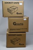 Four boxed as new Gravitis EU Secret Wall Safes (Secure storage for your valuables in this realistic