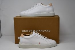 A pair of as new Uniform Standard Series 8 leather trainers (UK 6 - RRP £140).