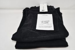 A pair of as new Frame Le High Flare jeans in condor (Size 26).