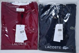 An as new Lacoste sweatshirt in Bordeaux (Size 44) together with a Lacoste hoodie in blue marine (US