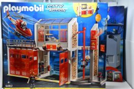 Two boxed as new Playmobile City Action sets to include police station and a fire station (4+)(