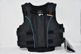 One as new Airowear Junior Outlyne Body Protector in black/turquoise.