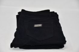 Two pairs of men's as new Dolce & Gabbana black jeans, 1 x size 46, 1 x size 48 (No tags).