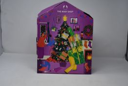 Two boxed as new The Body Shop, Make It Real Together advent calendars.