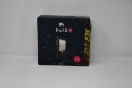 A boxed as new Ordnance Survey Trail 2 GPS hiking device.