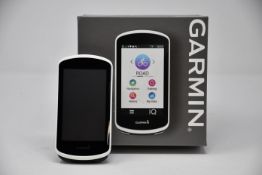 A boxed as new Garmin Ultimate Smart GPS bike computer Edge 1030 (Seal broken by us to check item is
