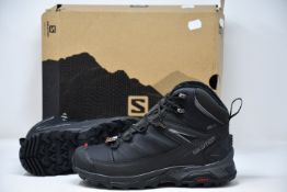 A pair of as new Salomon X Ultra Mid Winter CS boots (UK 7).