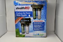 One boxed as new Hydro-Logic Stealth-RO300 customized reverse osmosis filter.