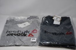 Six pairs of as new Reebok workout shorts (3 x S, 3 x L), two Reebok Linier Read T-shirts (M) and