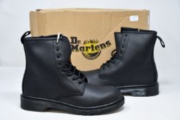 A pair of as new Dr Martens Serena Mono boots (UK 5).