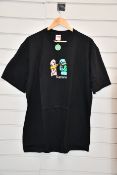 An as new Supreme Bite Tee in black (XL).