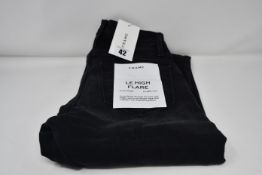 A pair of as new Frame Le High Flare jeans in condor (Size 25).