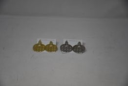 A pair of Kendra Scott Didi 14ct gold plated earrings and a pair of Kendra Scott Rhodium plated