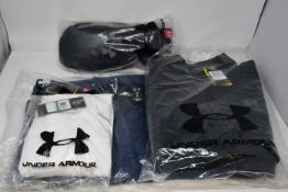 Two Under Armour X-Storm jackets (L), Cold Gear top (L) and Infrared gloves.