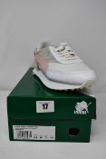 Two pairs of women's as new Puma Future Rider Soft Metal trainers (UK 6.5 and 7.5).