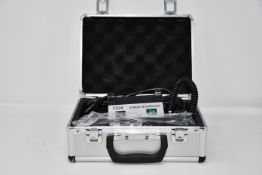 A YZ24 Streak Retinoscopy Optometry Diagnosis instrument.