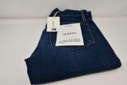 A pair of as new Frame Le Beau jeans in Burnside (Size 24).