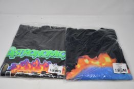 Two as new Cactus Jack T-shirts; World (XL) and Back Bling (XXL).