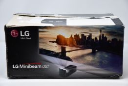 A boxed LG Minibeam UST projector.
