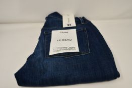 A pair of as new Frame Le Beau jeans in Burnside (Size 25).