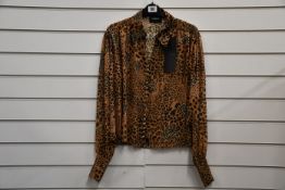 An as new The Kooples Hide & Seek blouse (Size 1 - RRP €170).