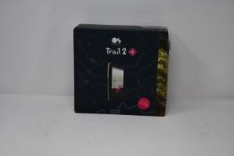 A boxed as new Ordnance Survey Trail 2 GPS hiking device.