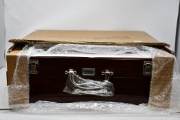 A boxed as new Belleek Living Occasions 72-piece cutlery set.