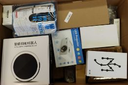 A box of assorted as new small electrical items and accessories.
