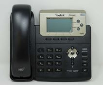 A boxed as new Yealink SIP-T23G Enterprise IP Phone in Black (Box opened, packaging states '
