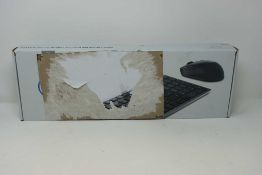 A boxed as new Dell KM717 Premier Keyboard And Mouse Set (QWERTY - UK) (Box sealed, some cosmetic