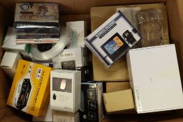 A box of assorted as new small electrical items and accessories.