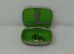 An as new pair of Phonak Virto M90-Titanium Hearing Aids (REF: 063-0488-01) with case, cleaning kit,