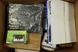 A box of assorted as new small electrical items and accessories.