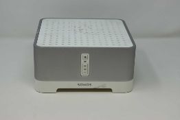 A pre-owned Sonos Connect Amp (Power cable included).