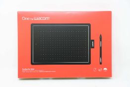 A boxed as new Wacom One Medium Graphics Tablet and Pen in Black & Red (Box sealed).