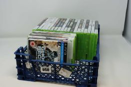 Twenty four assorted pre-owned Xbox 360 game disks and two pre-owned PlayStation 3 game disks.