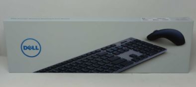 A boxed as new Dell KM717 Premier Keyboard And Mouse Set (QWERTY - UK) (Box sealed).