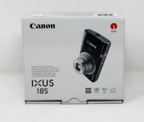 A boxed as new Canon IXUS 185 20MP 8x Zoom Compact Digital Camera in Silver.