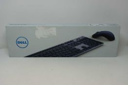 A boxed as new Dell KM717 Premier Keyboard And Mouse Set (QWERTY - UK) (Box sealed, some cosmetic