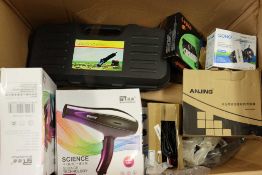 A box of assorted as new small electrical items and accessories.