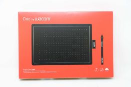 A boxed as new Wacom One Medium Graphics Tablet and Pen in Black & Red (Box sealed).